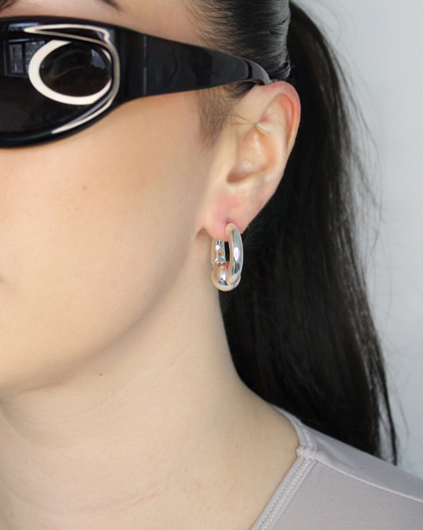 Trapped ball hoop earrings. Hinge hoop. Sterling silver plate over recycled zinc.
