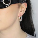 Trapped ball hoop earrings. Hinge hoop. Sterling silver plate over recycled zinc.