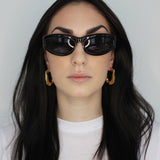 Large chain link hoop earrings. Hinge hoop design. 14k gold plate over recycled zinc.