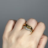 Liquid metal ring design. 14k gold plate over recycled zinc.