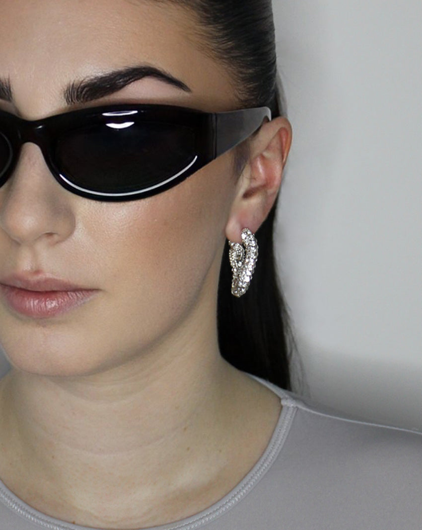 liquid twist hoop earrings with imitation diamonds. Sterling silver plate over recycled brass.