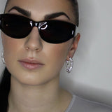 liquid twist hoop earrings with imitation diamonds. Sterling silver plate over recycled brass.