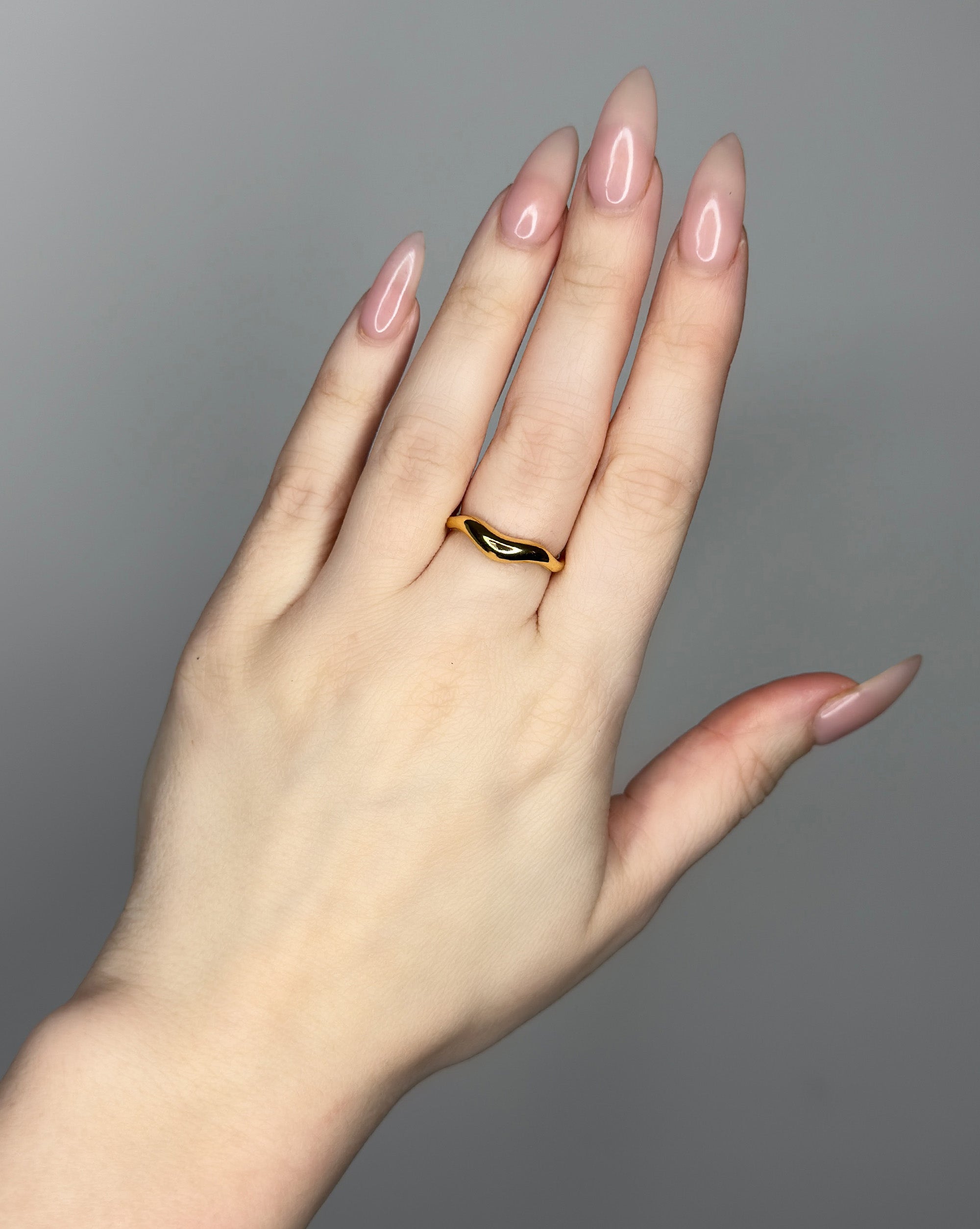 Liquid metal ring design. 14k gold plate over recycled zinc.