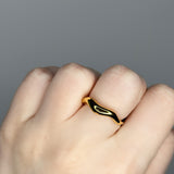 Liquid metal ring design. 14k gold plate over recycled zinc.