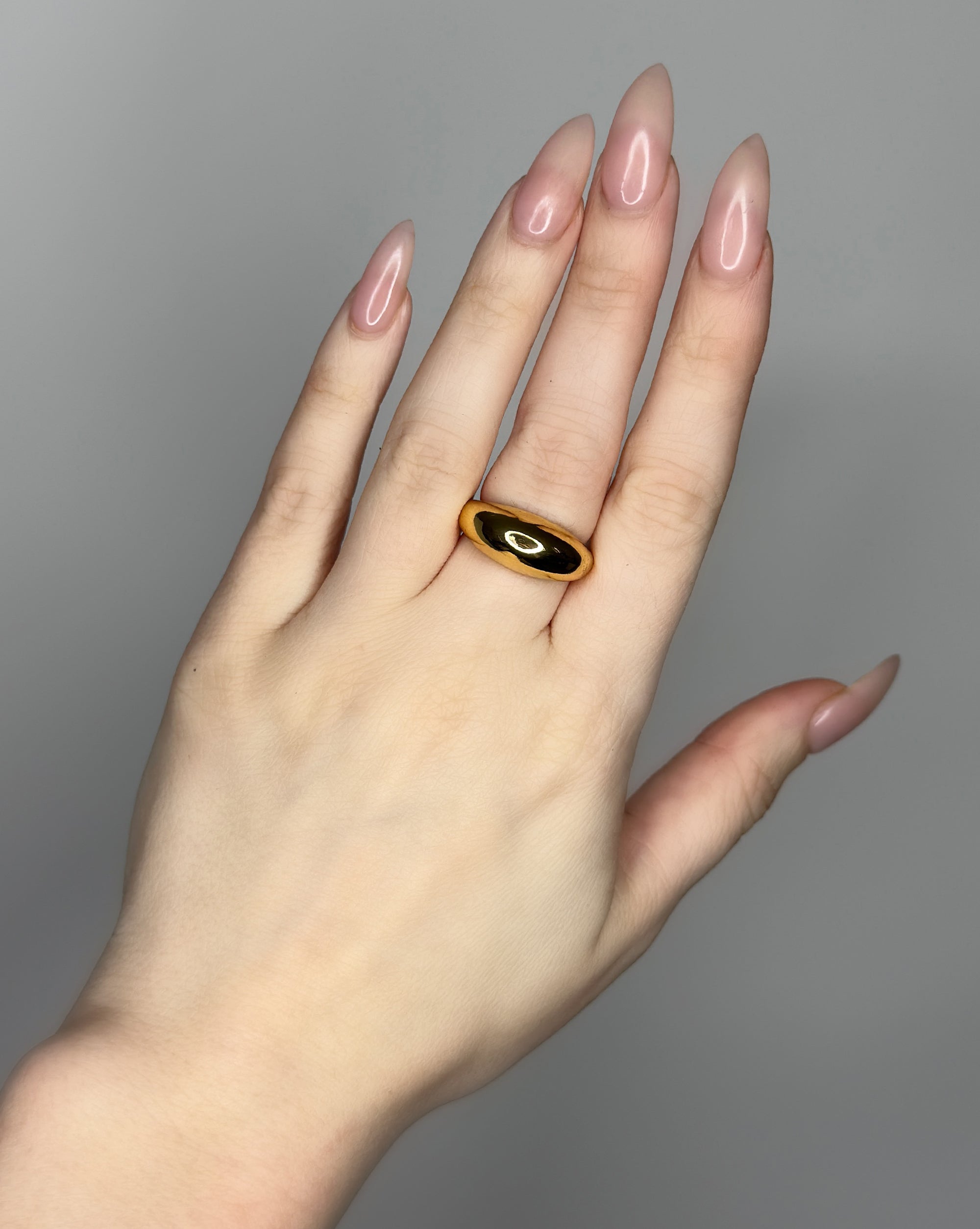 Stackable ring set featuring 2 dome ring designs  1 bubble dome ring design and 1 small ridged dome ring design. 14k gold plate over recycled zinc.