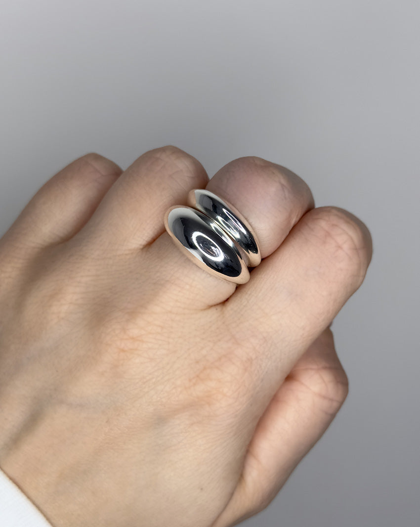Stackable ring set featuring 2 dome ring designs 1 bubble dome ring design and 1 small ridged dome ring design. Sterling silver plate over recycled zinc.