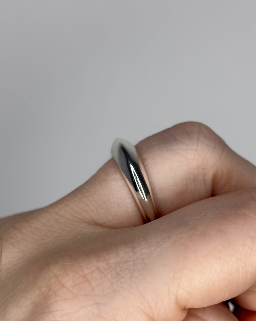 Stackable ring set featuring 2 dome ring designs 1 bubble dome ring design and 1 small ridged dome ring design. Sterling silver plate over recycled zinc.