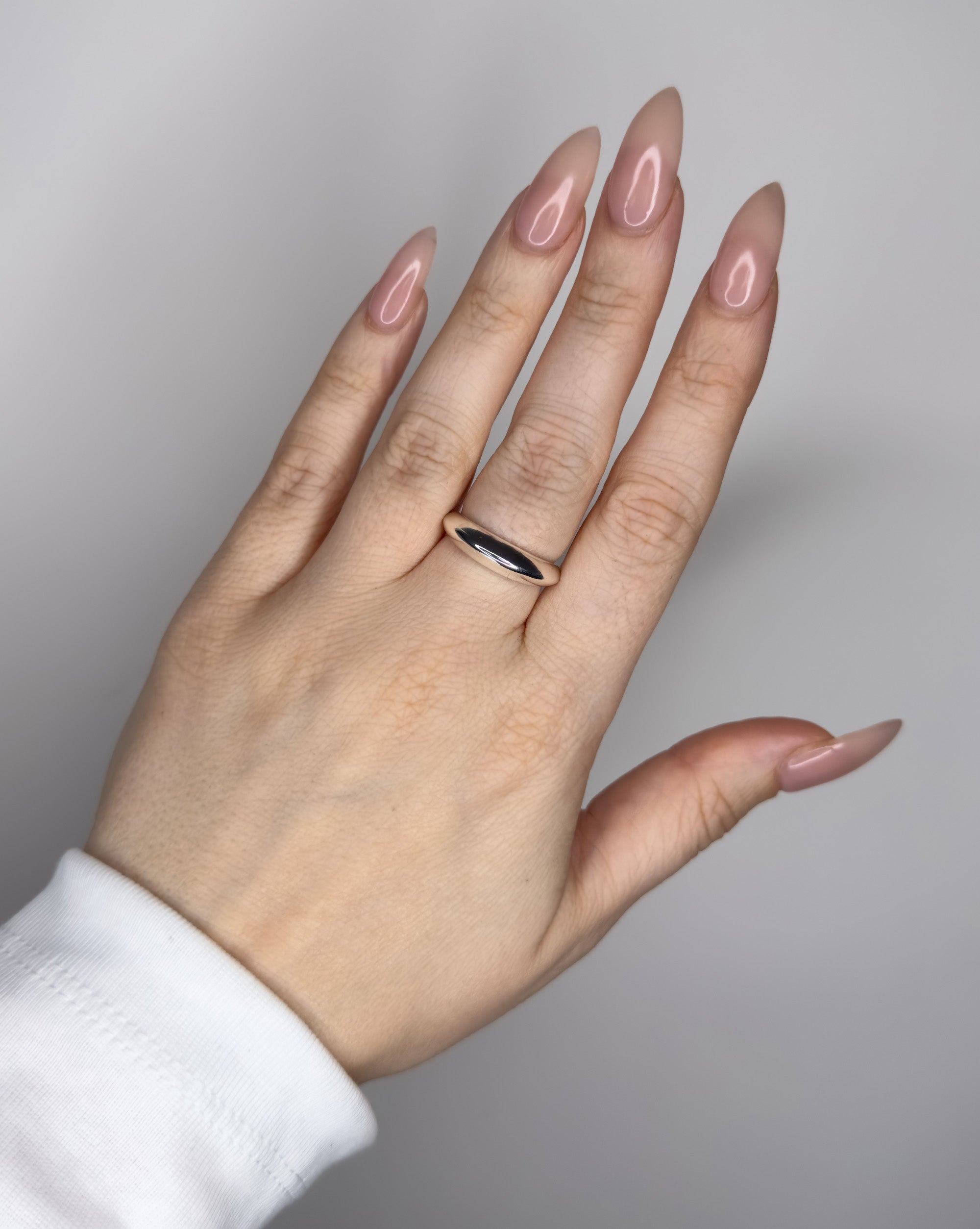 Stackable ring set featuring 2 dome ring designs 1 bubble dome ring design and 1 small ridged dome ring design. Sterling silver plate over recycled zinc.