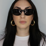 Thick tube hoop earrings. Lightweight hollow design.  50mm diameter. 14k gold plate over recycled brass.