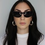 Thick tube hoop earrings. Lightweight hollow design. 50mm diameter. Sterling silver plate over recycled brass.