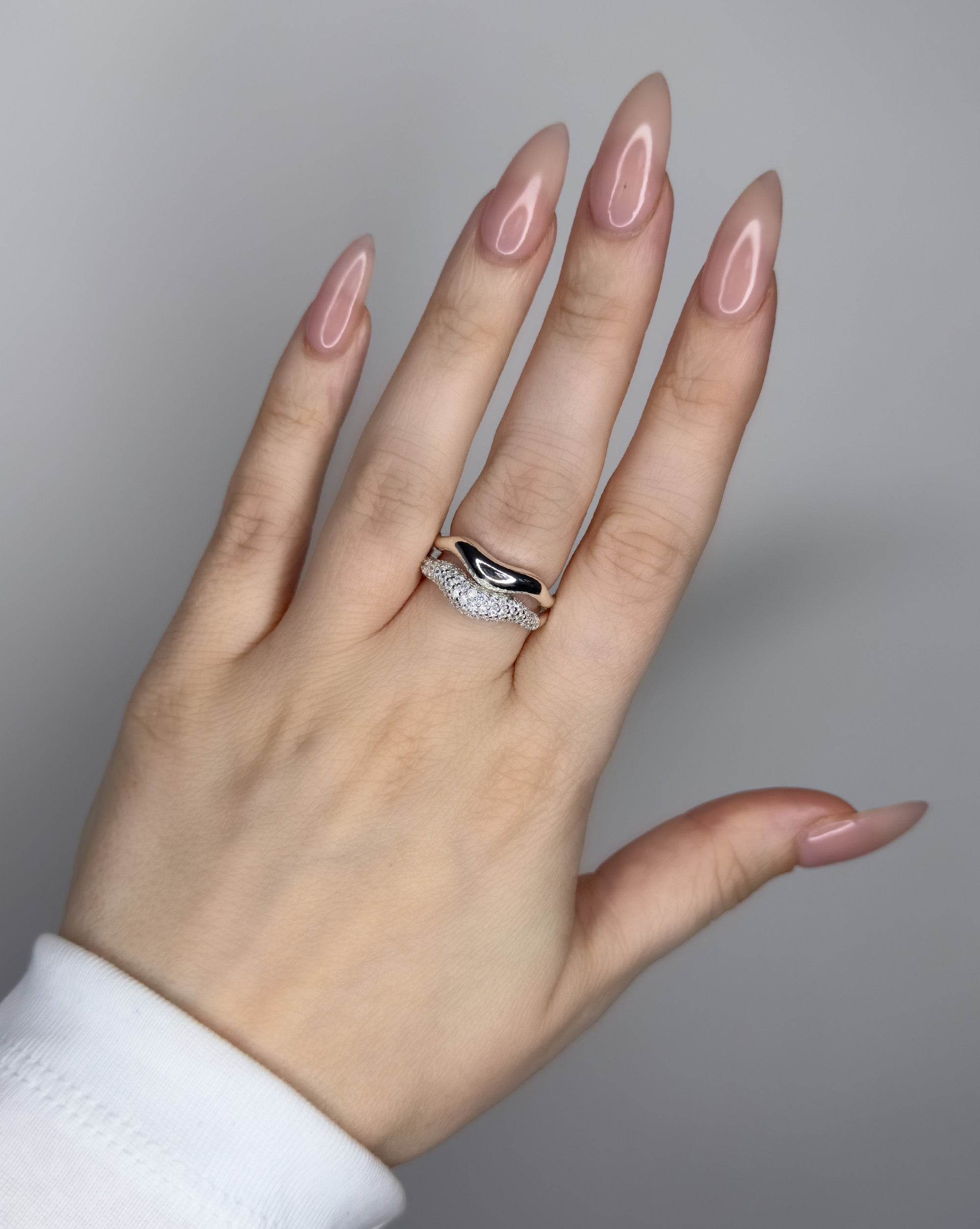 Liquid metal ring design. Sterling silver plate over recycled zinc.