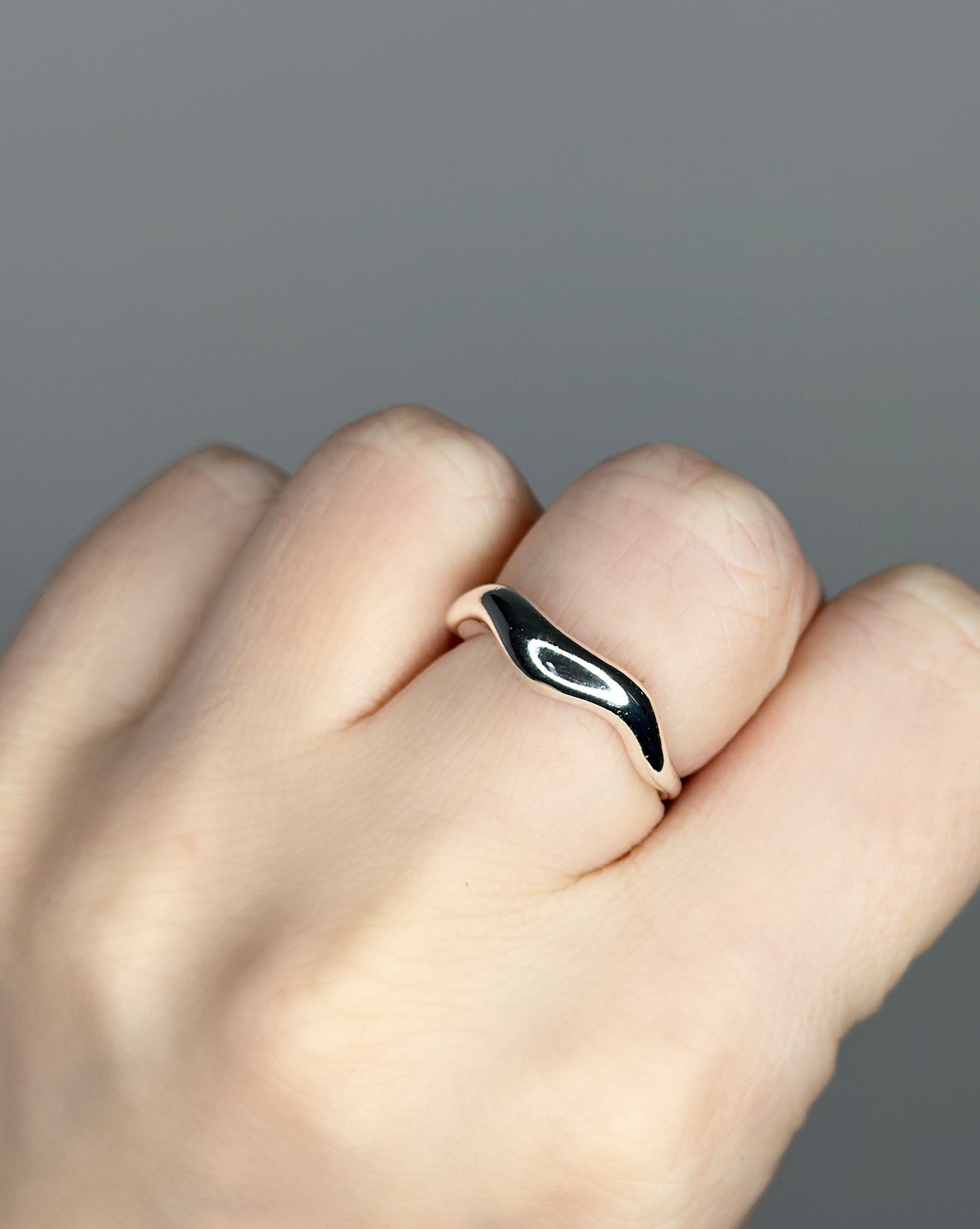 Liquid metal ring design. Sterling silver plate over recycled zinc.