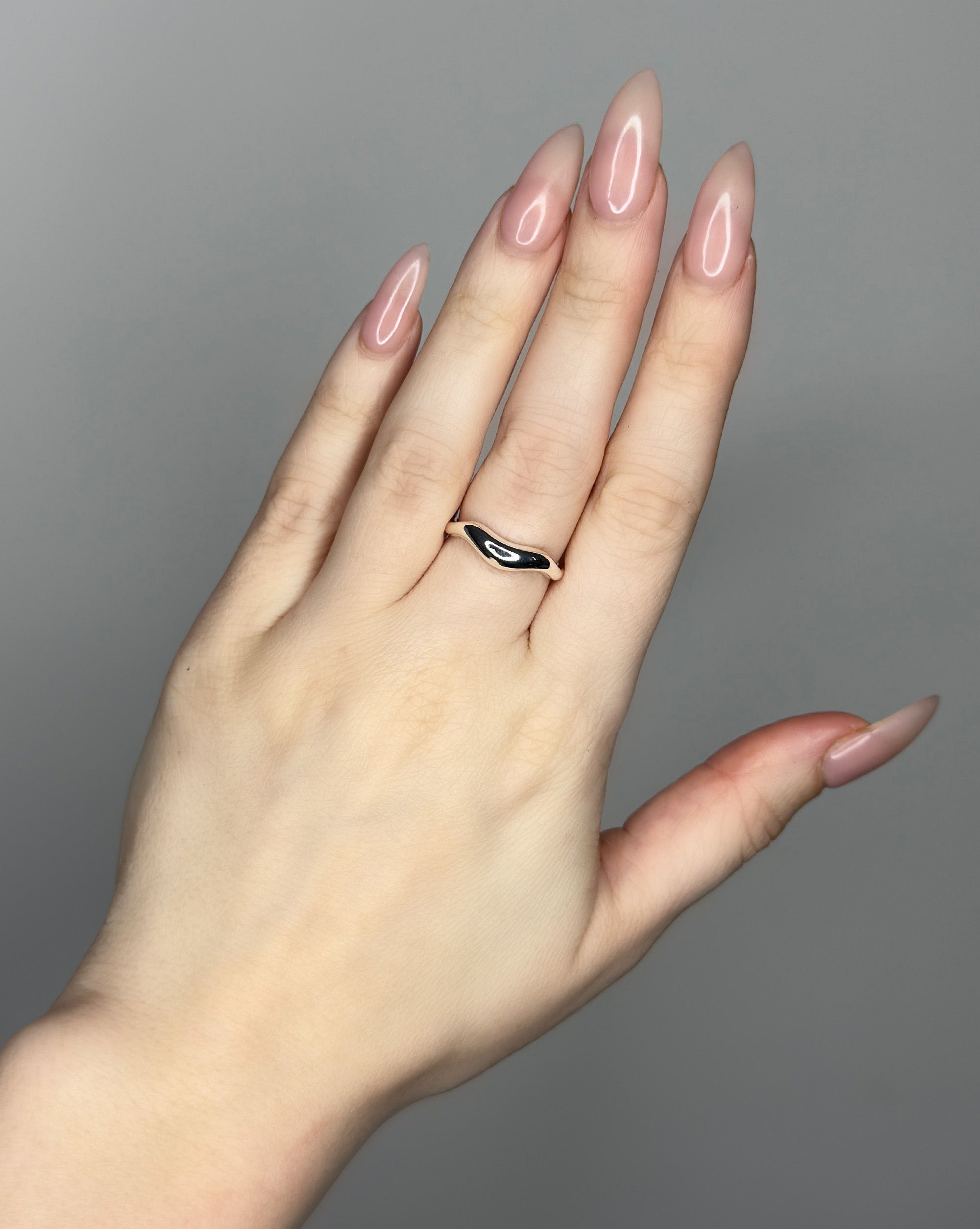 Liquid metal ring design. Sterling silver plate over recycled zinc.