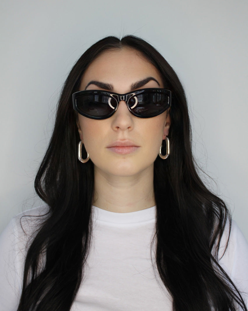Hoop earrings in large oval shape. Sterling silver plate over recycled zinc.